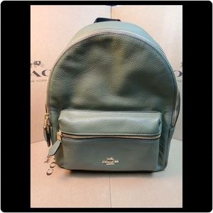 Coach Medium Charlie Backpack.
Military Green/Gold